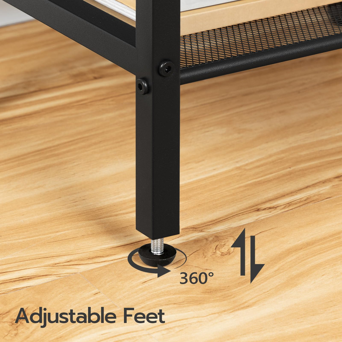 Close-up of a desk leg with adjustable feet on a wooden surface