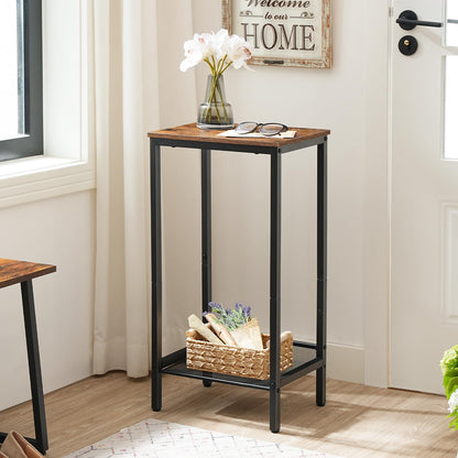 Small wooden table with black metal legs in a room with a 'Welcome to our Home' sign.