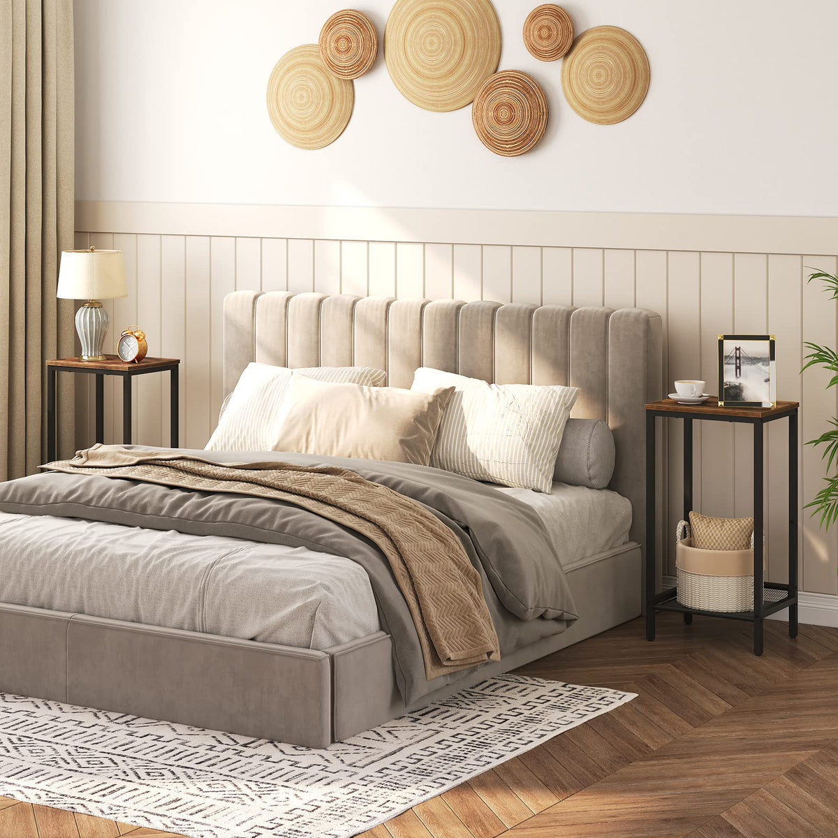 Neatly made bed with beige bedding in a bedroom setting.