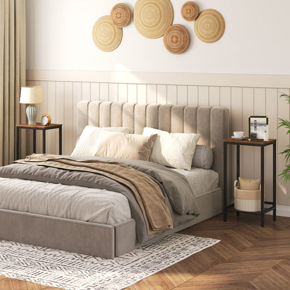 Neatly made bed with beige bedding in a bedroom setting.