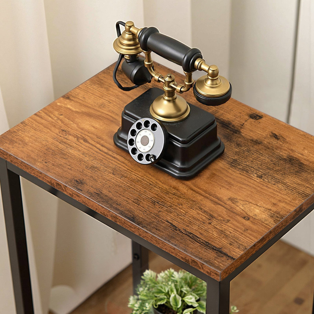 Vintage-style phone on a wooden table with a neutral background