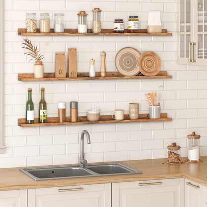 Kitchen with wooden shelves displaying various items against a white tiled wall.