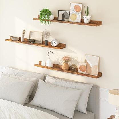 Wooden shelves above a bed with decorative items in a bedroom setting