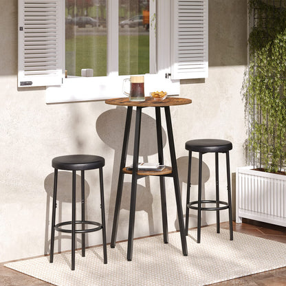 HOOBRO 2-tier round bar table with a rustic brown wood top standing on an outdoor balcony next to two bar stools.